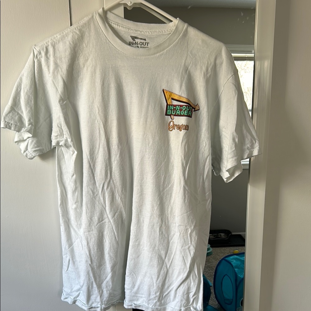 White Crew Neck Short Sleeve Tee with Vibrant Chest Design